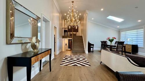 Clarkson-Lorne Park House | Luxury 4BR Retreat with Pool, Piano, Spa & Games