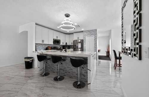 Crescent Lakes House | Luxury 4BR Villa Near Disney – Private Pool, Themed Rooms, BBQ & a Large Patio!
