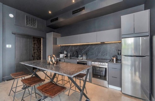 South Central Houston House | Luxury 5-Bedroom Oasis with Heated Pool