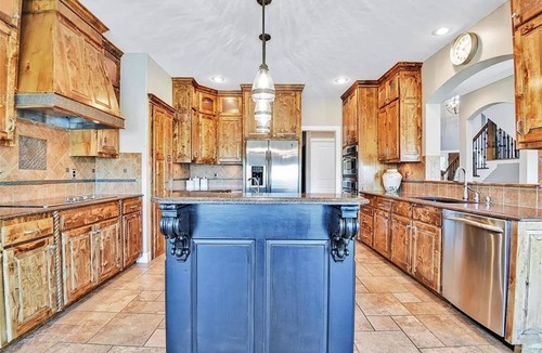 New Century House | Luxury 5-bedroom, screened porch, deck, patio, fenced yard, waterfront.