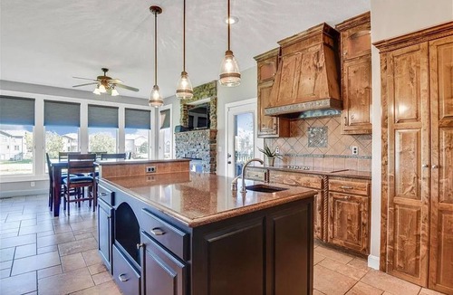 New Century House | Luxury 5-bedroom, screened porch, deck, patio, fenced yard, waterfront.