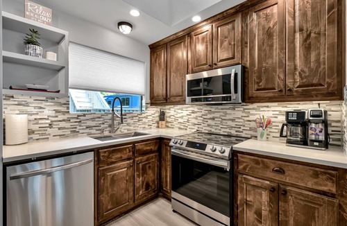 Willis House | Luxury 6BR Lakefront Home with Pool, Private Dock, Game Room, Putting Green & Outdoor Oasis!