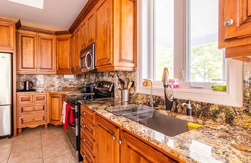 Carden House | Luxury 7000 sq ft Lakefront Home with Hot Tub, Sauna, and Pool