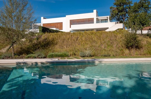 Caldes de Malavella Villa | Luxury architect design 4 bedroom villa at 5 star resort. Private garden. Pool.