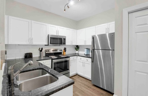 SoNo Apartment | Luxury at Midtown!