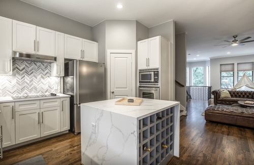 Cityplace House | Luxury Bathrooms, Rooftop Deck and Skyline Views in Huge, Chic Uptown Townhome