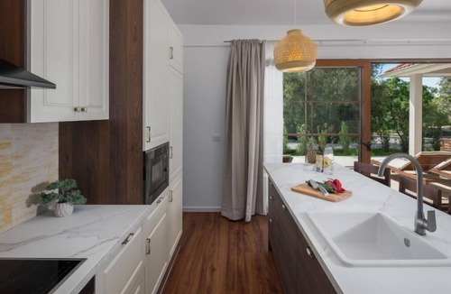 Bale House | Luxury Bay Villa with private hot tub by Interhome