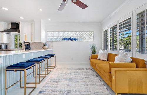 Royal Poinciana House | Luxury Beach House w/Pool, BBQ, 10 minutes to Beach