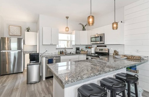 Surfside Beach Condo | Luxury Beachfront Condo with Covered Deck Steps From Beach & Golf Cart Rental