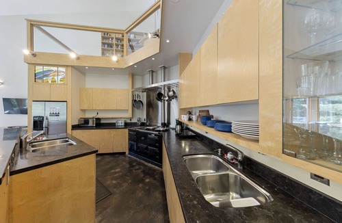North Kawartha Cottage | Luxury Blue Chalet with Hottub and Sauna 7000sqf of living space. Eco Friendly