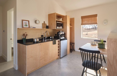 Stonewall Cabin | Luxury cabin in the center of the Texas Wine Country; large private porch w/hot tub, gas grill and fire pit; pet friendly
