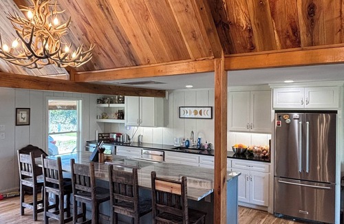 Cotton Gin House | Luxury Cabin on Private Lake - Rustic Elegance - ATV’s, Canoes, Fire Pit, Skeet
