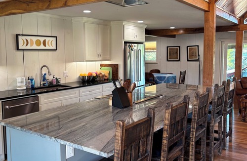 Cotton Gin House | Luxury Cabin on Private Lake - Rustic Elegance - ATV’s, Canoes, Fire Pit, Skeet