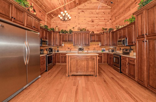 Pigeon Forge Cabin | Luxury cabin with hot tub, game room, theater, pool swim spa
