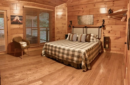 Pigeon Forge Cabin | Luxury cabin with hot tub, game room, theater, pool swim spa