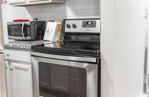 Trinidad House | Luxury Capitol Hill Victorian — Private Gated Parking & Modern Kitchen