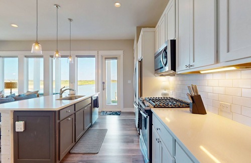 Rockport Condo | Luxury corner condo with central AC and pool & firepit access