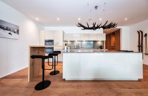 Davos-Dorf Apartment | Luxury Davos Apt for 4 with Panorama Terrace & 5-star Hotel Spa Access