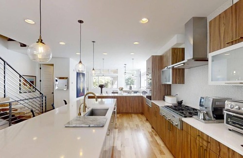 Cherry Creek Villa | Luxury Denver Townhome w/Golf Simulator & Sunset Rooftop Deck