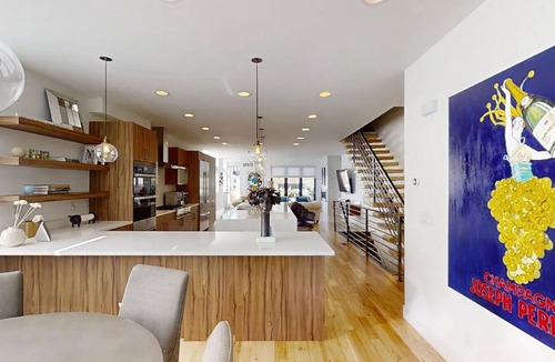 Cherry Creek Villa | Luxury Denver Townhome w/Golf Simulator & Sunset Rooftop Deck