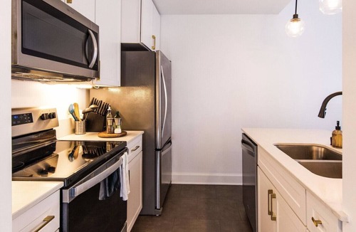 East Town Apartment | Luxury Downtown Apt with Parking, Gym, and Lap Pool