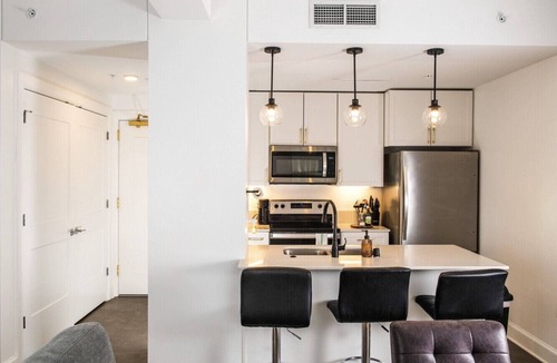 East Town Apartment | Luxury Downtown Apt with Parking, Gym, and Lap Pool