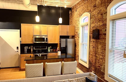 Jonesboro Condo | Luxury Downtown JB Condo-Designated Parking!