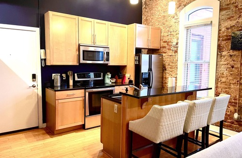 Jonesboro Condo | Luxury Downtown JB Condo-Designated Parking!