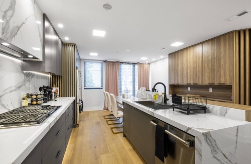 North Philadelphia West House | Luxury Downtown Mansion! Garage Parking! Roofdeck!