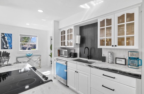 Fort Myers House | Luxury family friendly WATERFRONT home with a POOL, PLAYGROUND, FIREPIT & BEACH