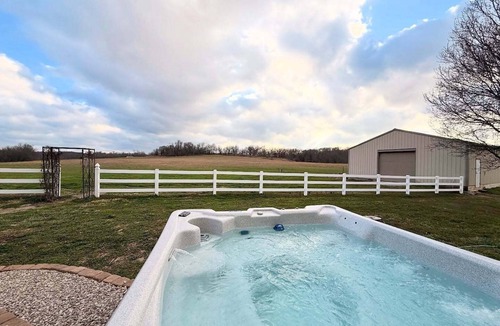 Brookline Station House | Luxury Farmhouse Retreat with Hot Tub and Private River Access