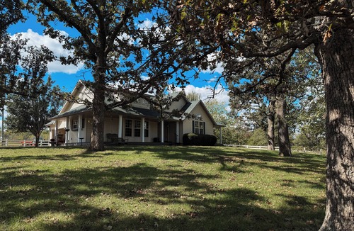 Brookline Station House | Luxury Farmhouse Retreat with Hot Tub and Private River Access