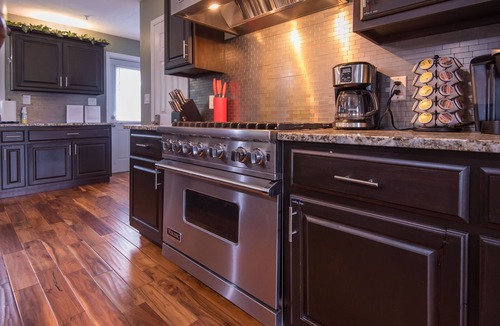 Waukee House | LUXURY GETAWAY! ARCADE, POOL TBL, PING PONG, HOT TUB, DECK! ACCESS TO POOLS!