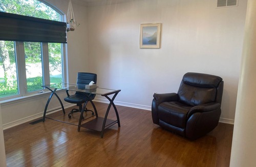 Sarnia House | Luxury Home Near 402 Whirlpool Suite, Fireplace, Full Kitchen & EV Charger