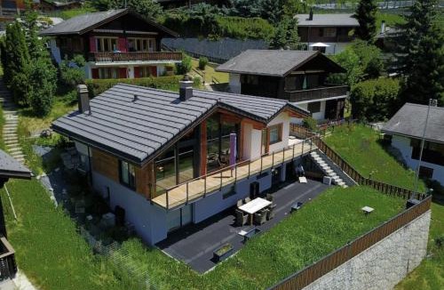 Graechen Ski Chalet | Luxury Home Panoramic view Fireplace Sauna Garden