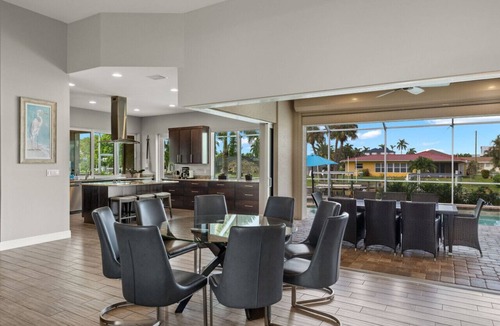 Yacht Club House | Luxury home w/2 suites, LARGE pool, spa, lanai. Quick gulf access! 6 Bikes! EV!