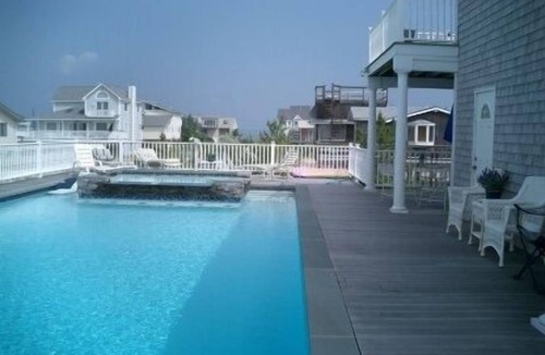 West Hampton Dunes House | Luxury Home W/Huge Rap Around deck largest Pool on ocean private large dining