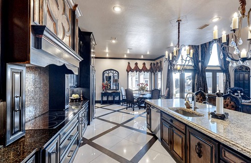 Lubbock House | Luxury home with private pool, waterslide, grill, home theater, & office