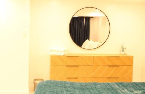 Schenectady Apartment | Luxury king bed parking & washer