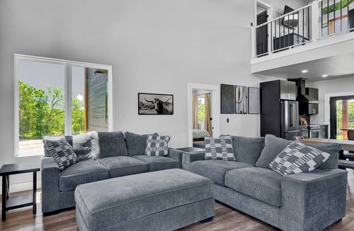 Longtown House | Luxury Lake Retreat: Hot Tub, Inground Trampoline, Putting Green & Sleeps 14