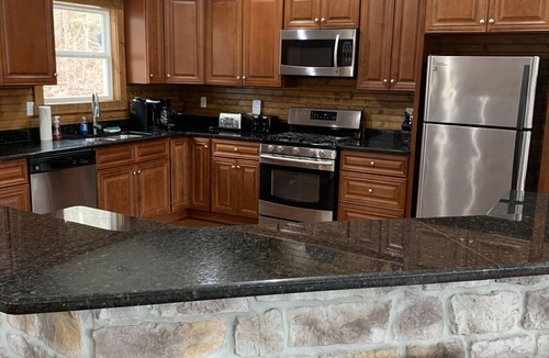 La Follette House | Luxury Lakefront 9 Bedroom 8 bathroom with 2-Story Dock & Arcade Room Sleeps 28