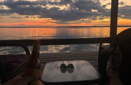 West Livingston House | Luxury Lakefront Lodge with private water trampoline, open boat slip