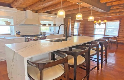 Edgartown Villa | Luxury Log Villa with Endless Pool, Hot Tub & Expansive Grounds