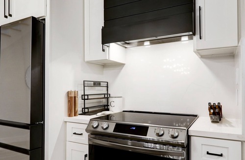 Memorial Parkway House | Luxury Modern Farmhouse + Game Room + Chef Kitchen