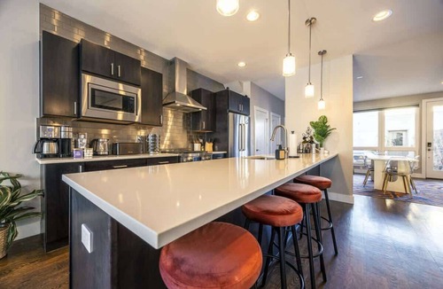 Sloan Lake Apartment | Luxury Oasis: Heated Pool, Rooftop Spa, Fire Pits