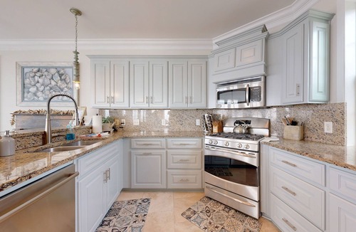 Saint Simons Island Villa | Luxury Oceanfront Villa with pool, firepit, & rooftop view-Walk to Pier Village!