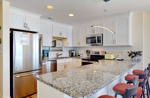 Carolina Beach Condo | Luxury Oceanfront Top Floor Condo w/Rooftop Deck, Stunning Views, Pool & Elevator in Downtown CB