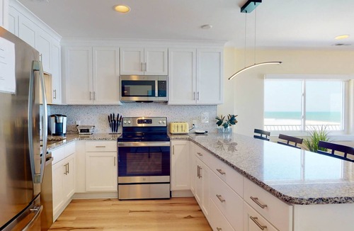 Carolina Beach Condo | Luxury Oceanfront Top Floor Condo w/Rooftop Deck, Stunning Views, Pool & Elevator in Downtown CB