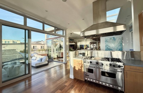 The Strand House | Luxury OceanView Downtown Oasis, Steps to Beach, Shops & Fine Dining