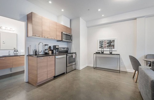 International District Apartment | Luxury Old Montreal Suite with Soaring Ceilings
